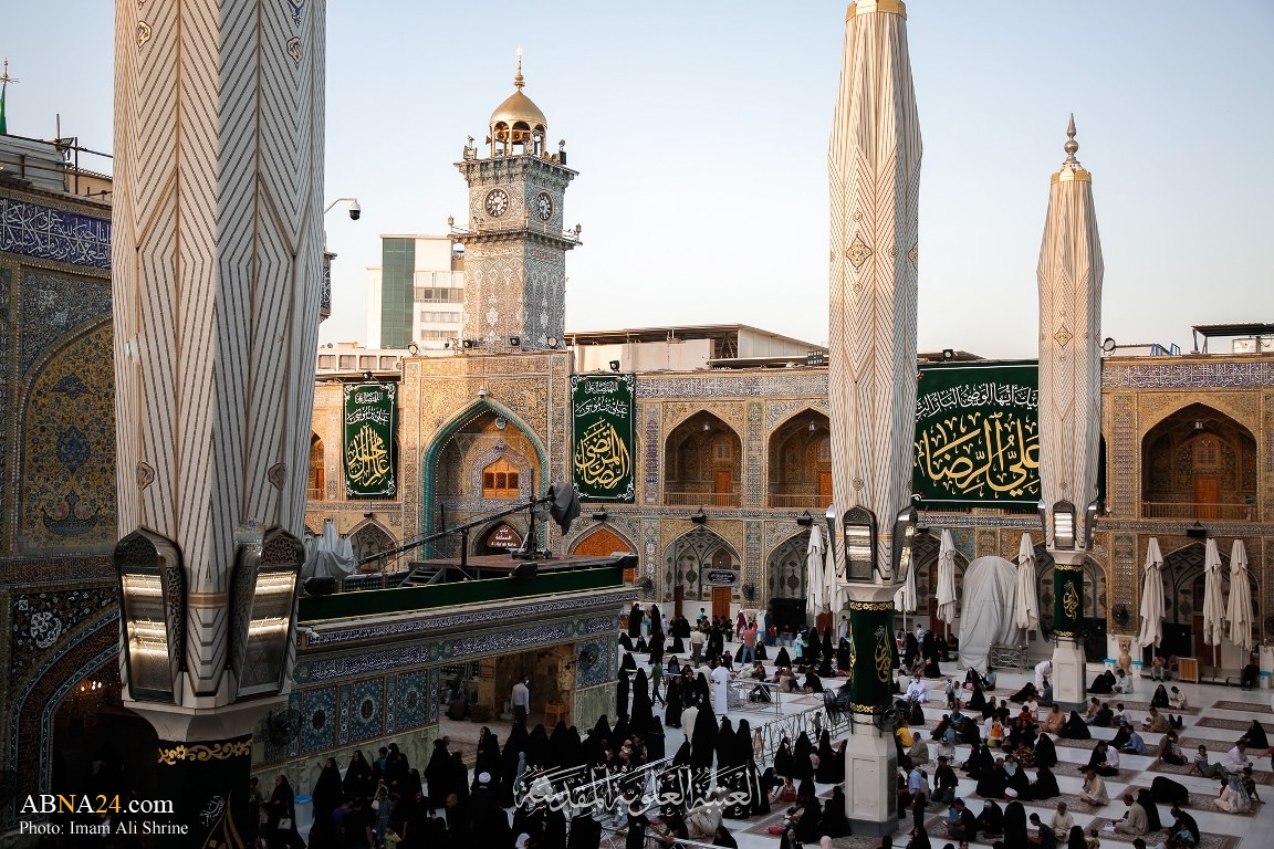 Photos: Decorating Imam Ali shrine with green banners on auspicious birth of Imam al-Ridha