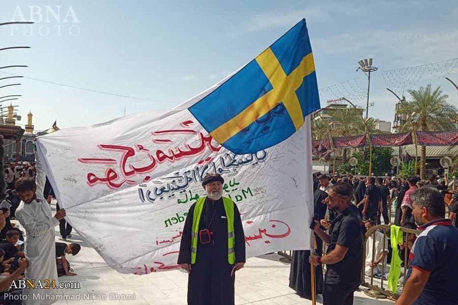 Flag brought to Karbala with Swedish Shiites signature